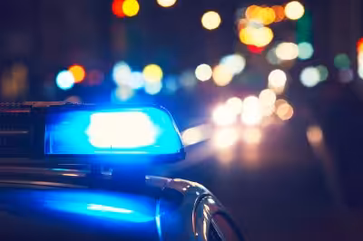 Police car ensures city safety backed by reliable insurance products.