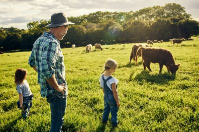 Grandfather and granddaughter enjoying nature together and embrace the benefits of comprehensive insurance products