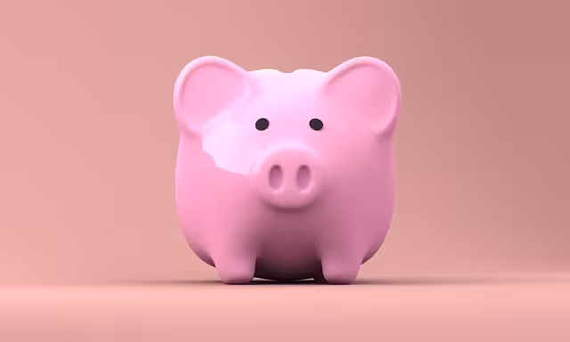Pink piggy bank on a pink background.
