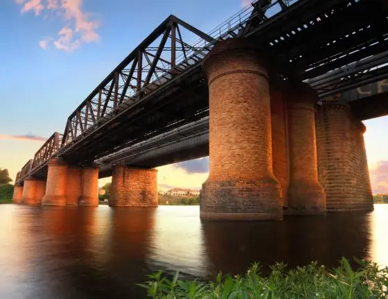 Historic Victoria bridge over river at sunset at the Nepean River