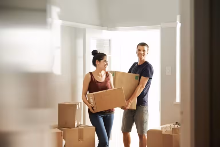 Couple moving into a new home with support from Tanti Financial home loans and trusted mortgage brokers.