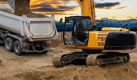 A tractor in motion, exemplifying the coverage and support provided by Earthpack Insurance.